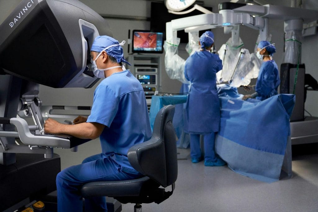 Surgeon controlling a da Vinci robotic surgical system